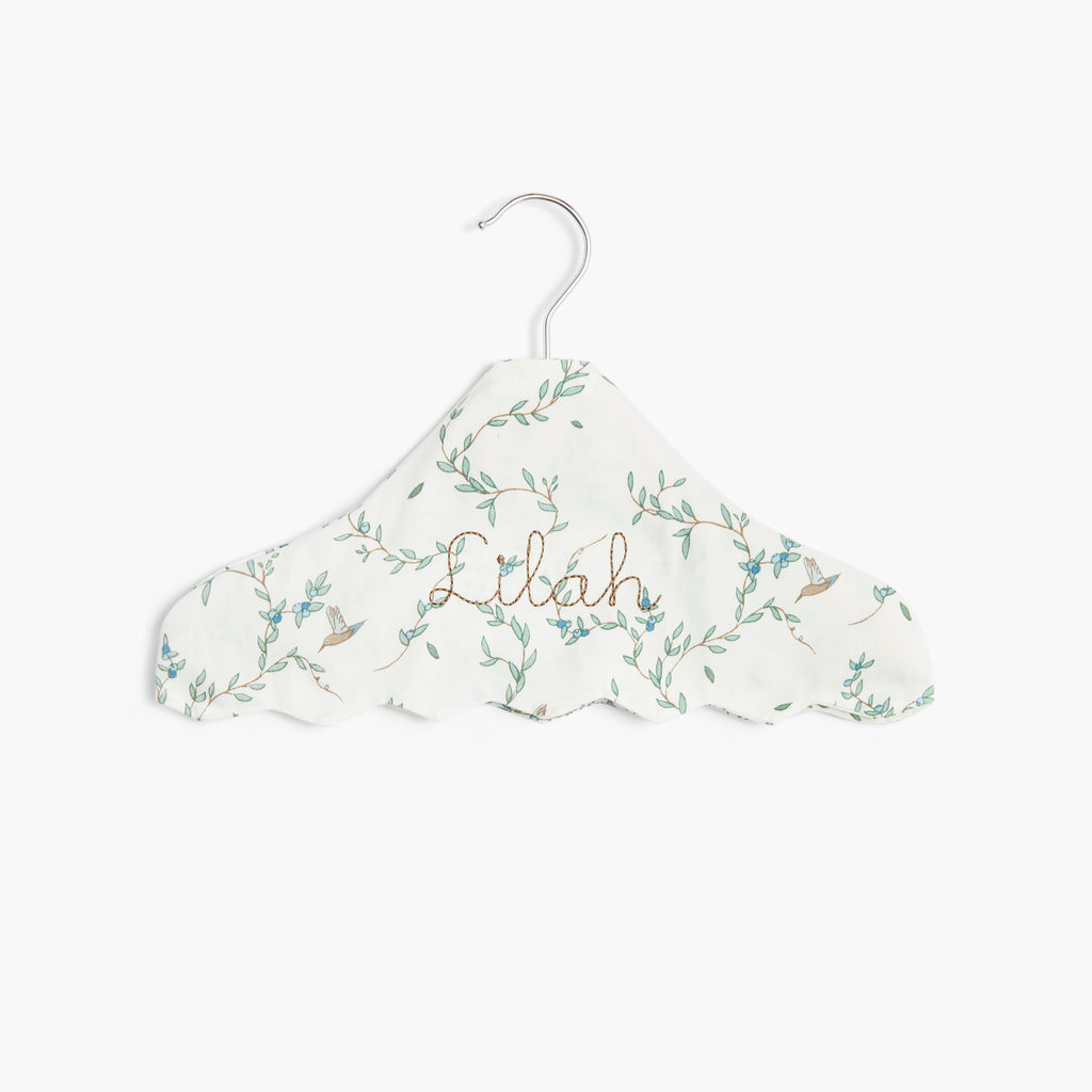 Children's Hanger in Secret Garden with a personalized monogram name on front.