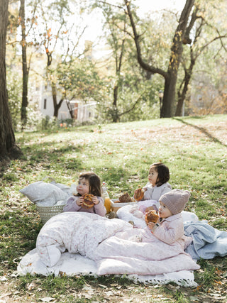 Little Girls having a picnic in central park