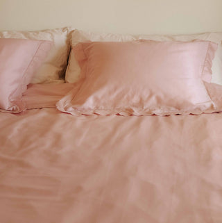 Scalloped Starlight Full Queen Duvet in Rose on bed