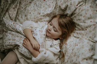 Toddler falling asleep in bed