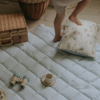 Picnic Gingham Play Mat in Blue with toddler walking on top