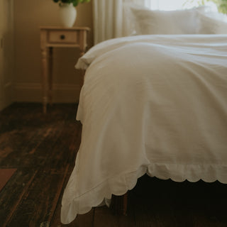 Scalloped Starlight Full/Queen in White corner detail of scallop and embroidery