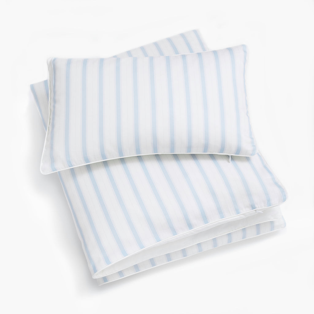 Personalize Me: Toddler Pillow laying on top of Toddler Duvet In the Coastal Stripe Print 