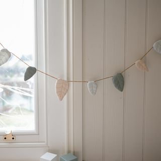 Garden Garland draped across a sunny window.