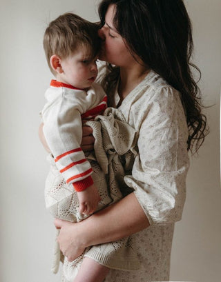 Image of mom holding toddler