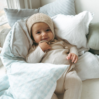 Baby wrapped in a duvet