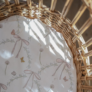 Swaddle Blanket of Bows and Butterfly in Bassinet