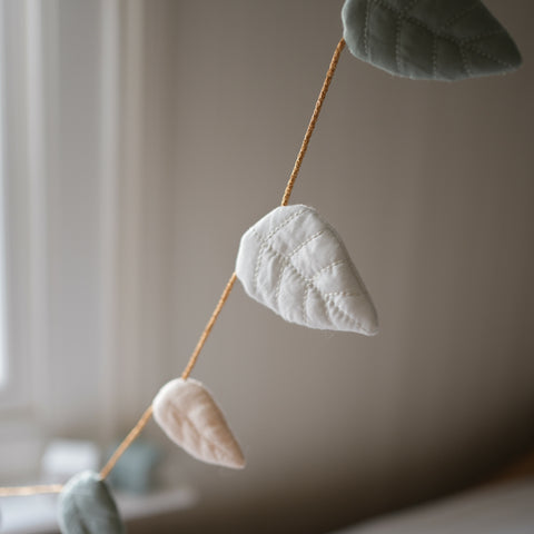 Secret Garden Garland hanging over bed