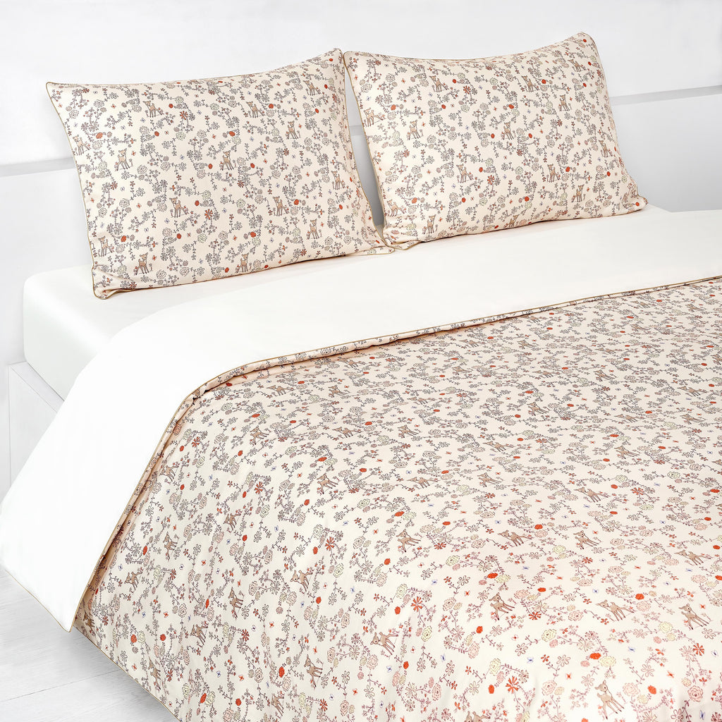 Full Queen Duvet Cover in the "Into The Woodlands" print in the color ivory. Two Standard Pillowcases shown in same print