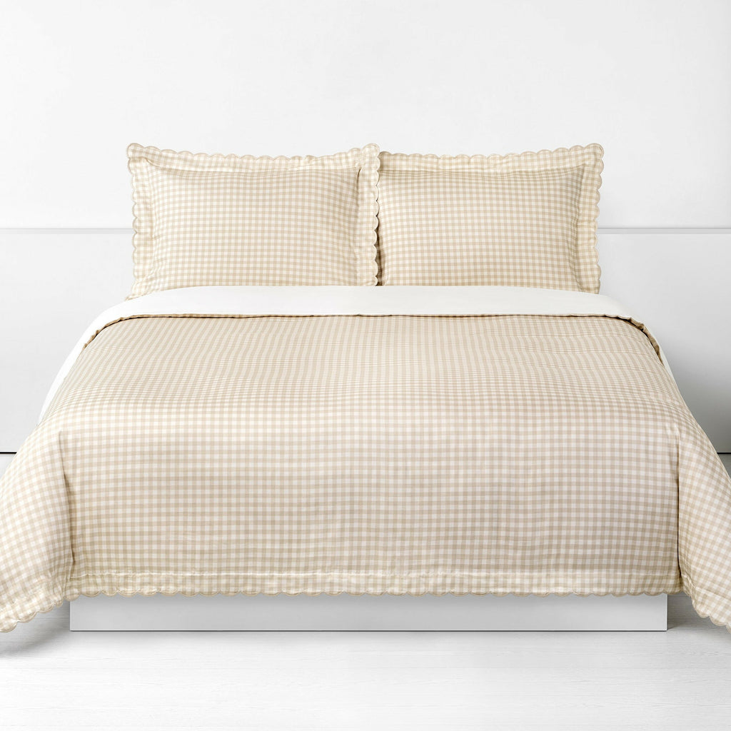 Picnic Gingham Full/Queen Duvet Cover in the Beige Print displayed on bed. Shown with two standard size pillow cases in the same print.