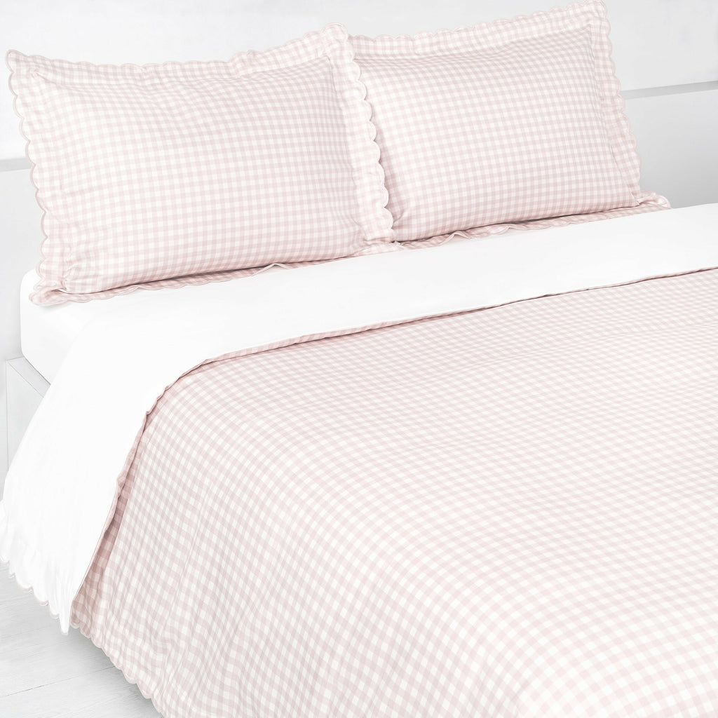 Picnic Gingham Full/Queen Duvet Cover in the Pink Print displayed on bed. Shown with two standard size pillow cases in the same print.