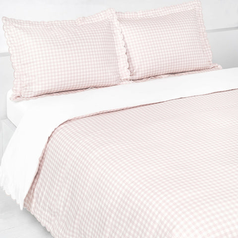 Picnic Gingham Full/Queen Duvet Cover in the Pink Print displayed on bed. Shown with two standard size pillow cases in the same print.