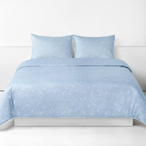 Once Upon A Time Full/Queen Duvet Cover in the Blue Print displayed on bed. Shown with two standard size pillow cases in the same print.