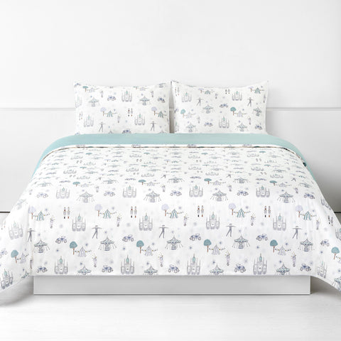 Adventures in Wonderland Full/Queen Duvet Cover in the Aqua Print displayed on bed. Shown with two standard size pillow cases in the same print.