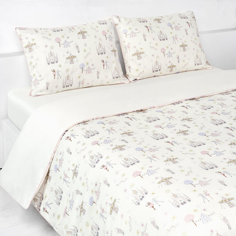 Adventures in Wonderland Full/Queen Duvet Cover in the Rose Print displayed on bed. Shown with two standard size pillow cases in the same print.