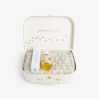 Clean & Tidy Gift Set which includes: Beige Gingham Toiletry Pouch, Minois Gentle Cream and Dry Oil.