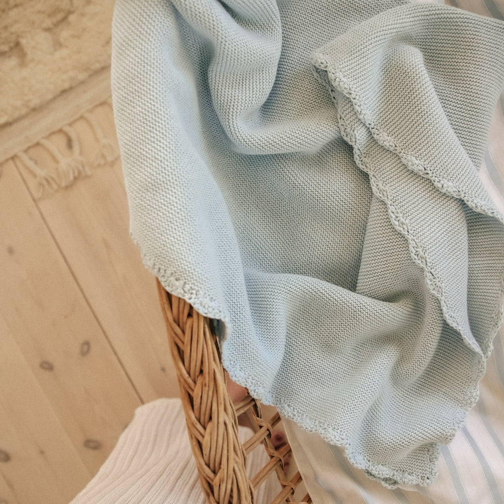 Knit Blanket in Blue in Crib 