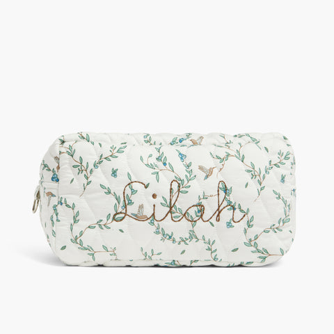 Toiletry Pouch in Secret Garden with child's name monogramed on front.