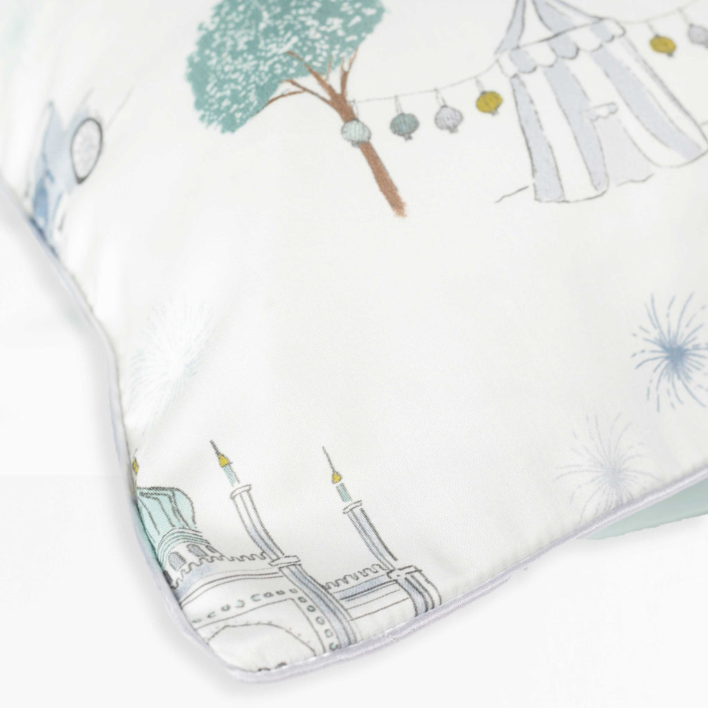 Corner of Pillow of the Adventure in Wonderland Print in Aqua