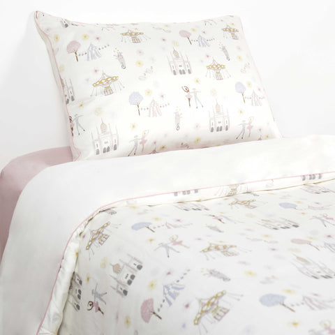Adventure In wonderland Print in Pink on a Twin Bed with a Pillowcase