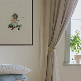Art work hanging on a wall of gooseling in a plane