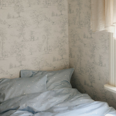 Once Upon A Time Full/Queen Duvet Cover in the Blue Print displayed on bed. Shown with two standard size pillow cases in the same print.