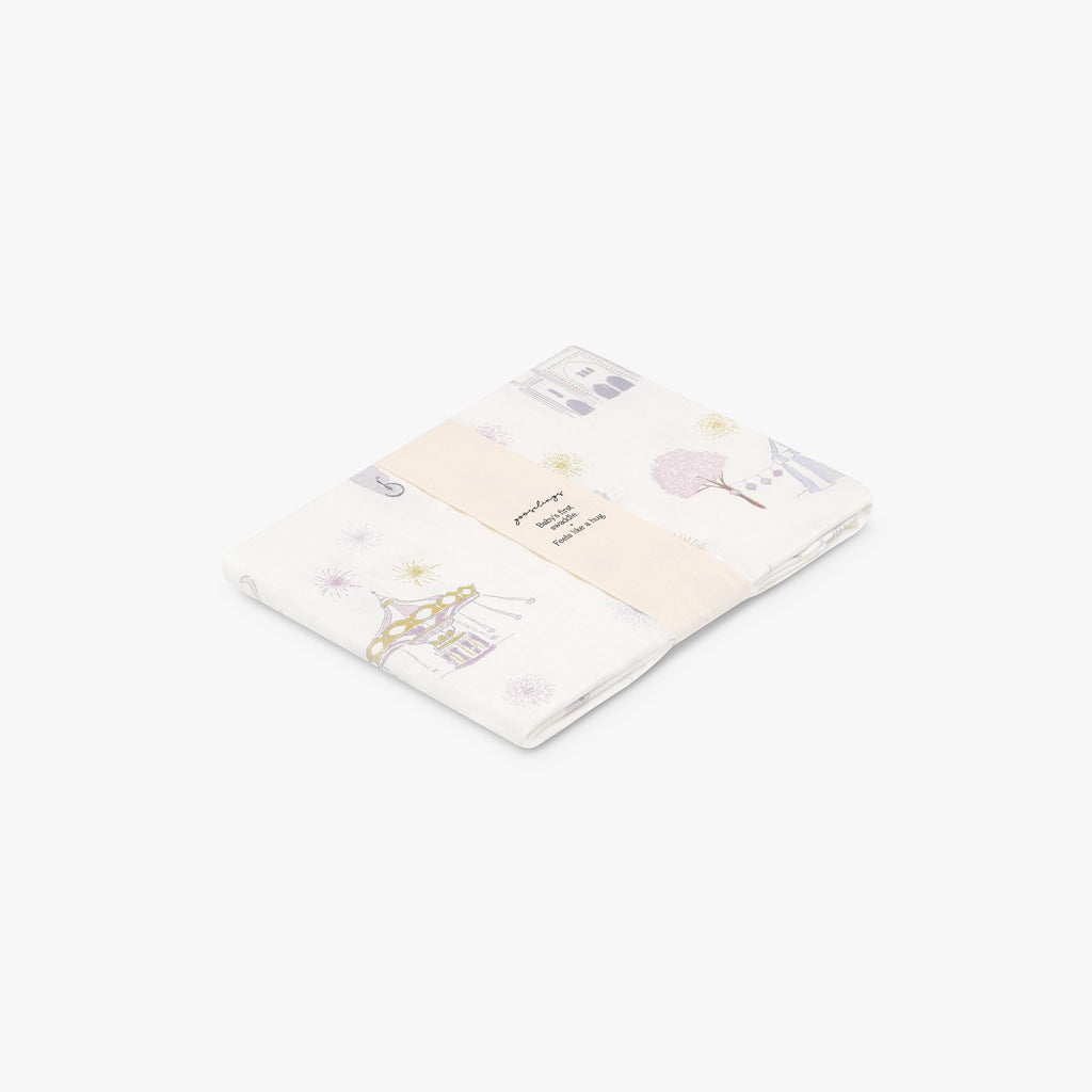Adventures in Wonderland Swaddle Blanket in Rose.