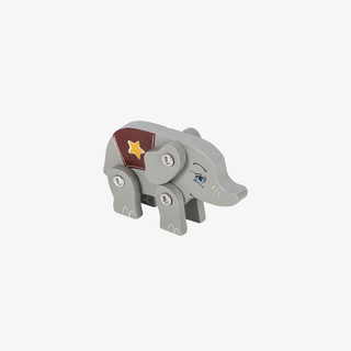 Gray elephant toy with a red flag featuring a yellow star on a white background