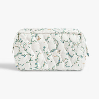 Quilted pouch with floral pattern on a white background