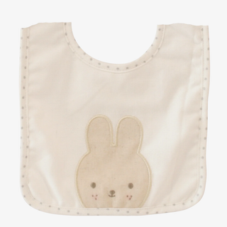 Ivory baby bib with a bunny face design on a white background