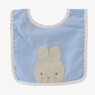 Baby bib with a bunny design and a light blue background