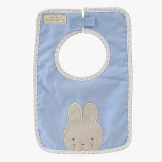 Blue bib with a bunny design on a white background