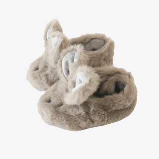 Pair of fluffy baby booties with bunny design on a white background