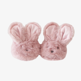 Pair of pink bunny slippers on a white background