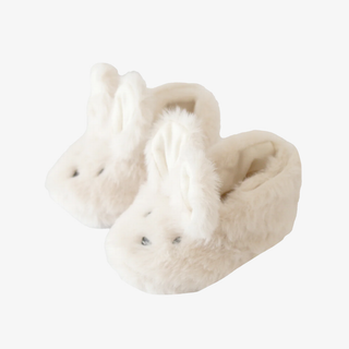 Pair of fluffy bunny slippers on a white background