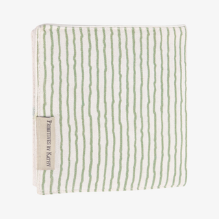 Striped fabric book with a brand label on a white background