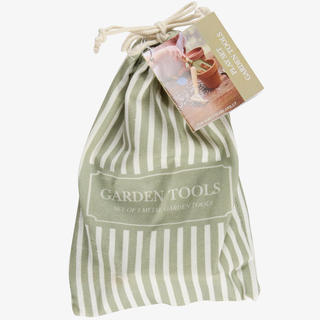 Striped green and white drawstring bag with 'Garden Tools' text and a tag on a white background