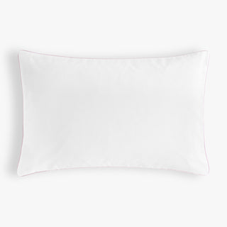 White back side pillow pink piping on a white background 