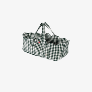 Green and white checkered bassinet bag on a white background.