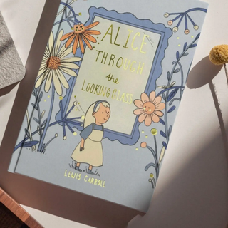 Book cover of 'Alice Through the Looking Glass' by Lewis Carroll with floral illustrations.