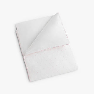 Folded duvet with white and pink polka dot 