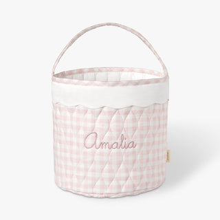 Pink checkered storage basket with 'Amalia' embroidery on a white background