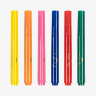 Set of six colorful markers on a white background