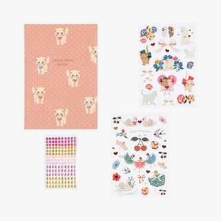 Set of stationery items including a notebook with cat illustrations, decorative stickers, and a small notepad on a white background.