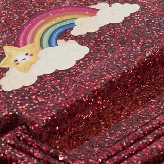 Red glittery box with a rainbow, cloud, and star design.