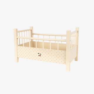 Beige crib with a simple design on a white background