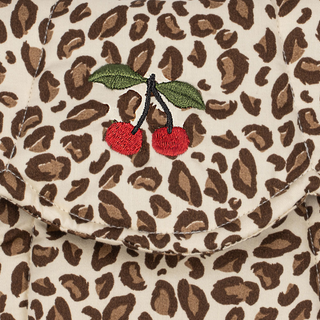 Leopard print fabric with embroidered cherries and leaves