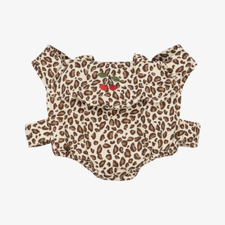 Leopard print baby doll romper with cherry design on a white background
