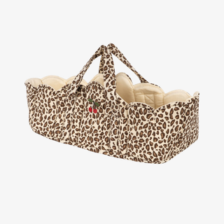 Leopard print baby doll basket on a white background