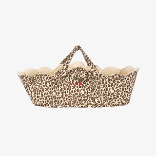 Basket with leopard print pattern and cherry design on a white background